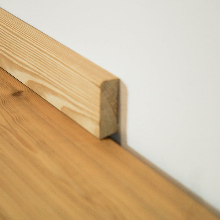 Solid larch wood skirting boards, natural oiled